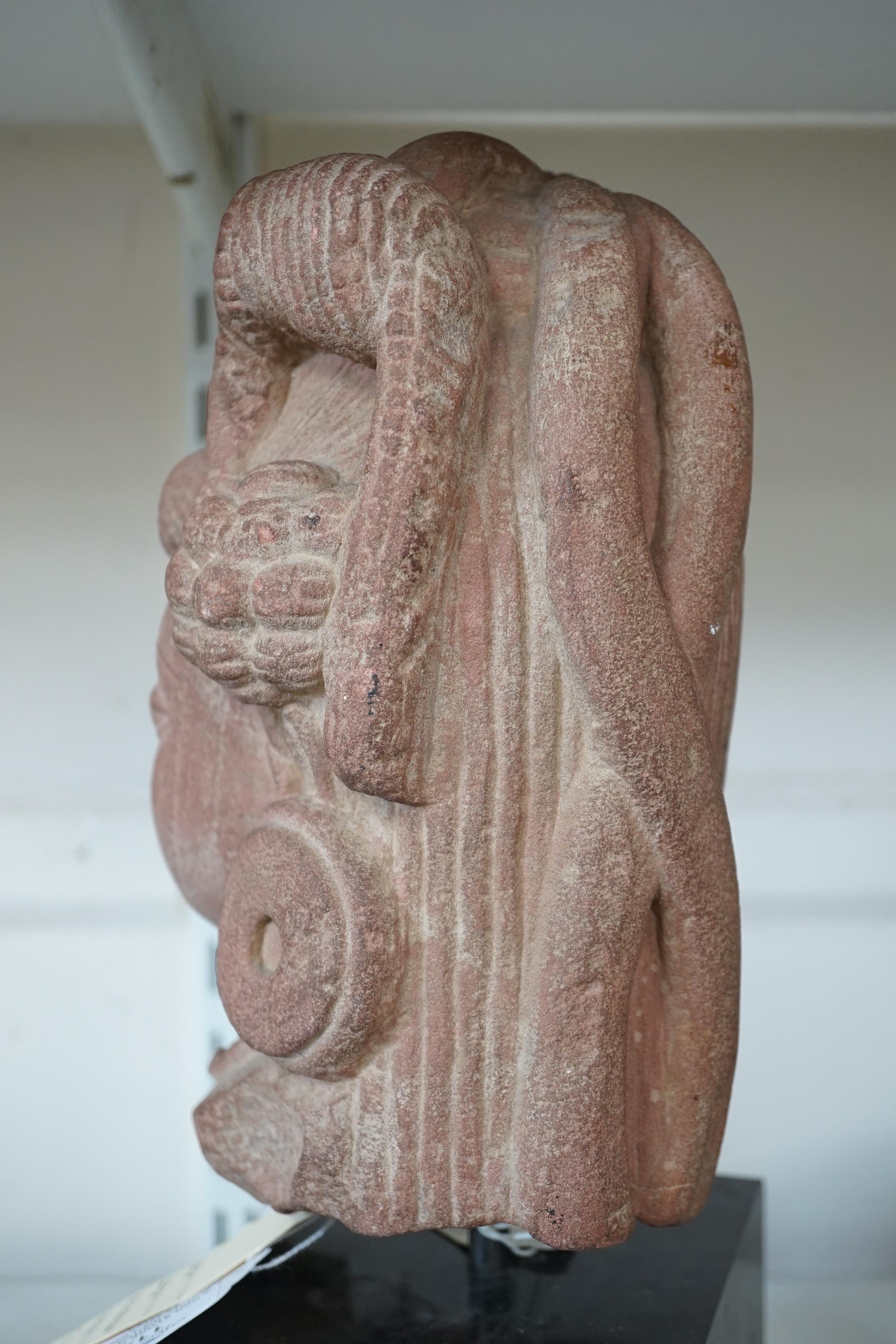 A red stone head of Ardhanarishvara, Muthura region, India, Gupta period, c.5th century A.D.